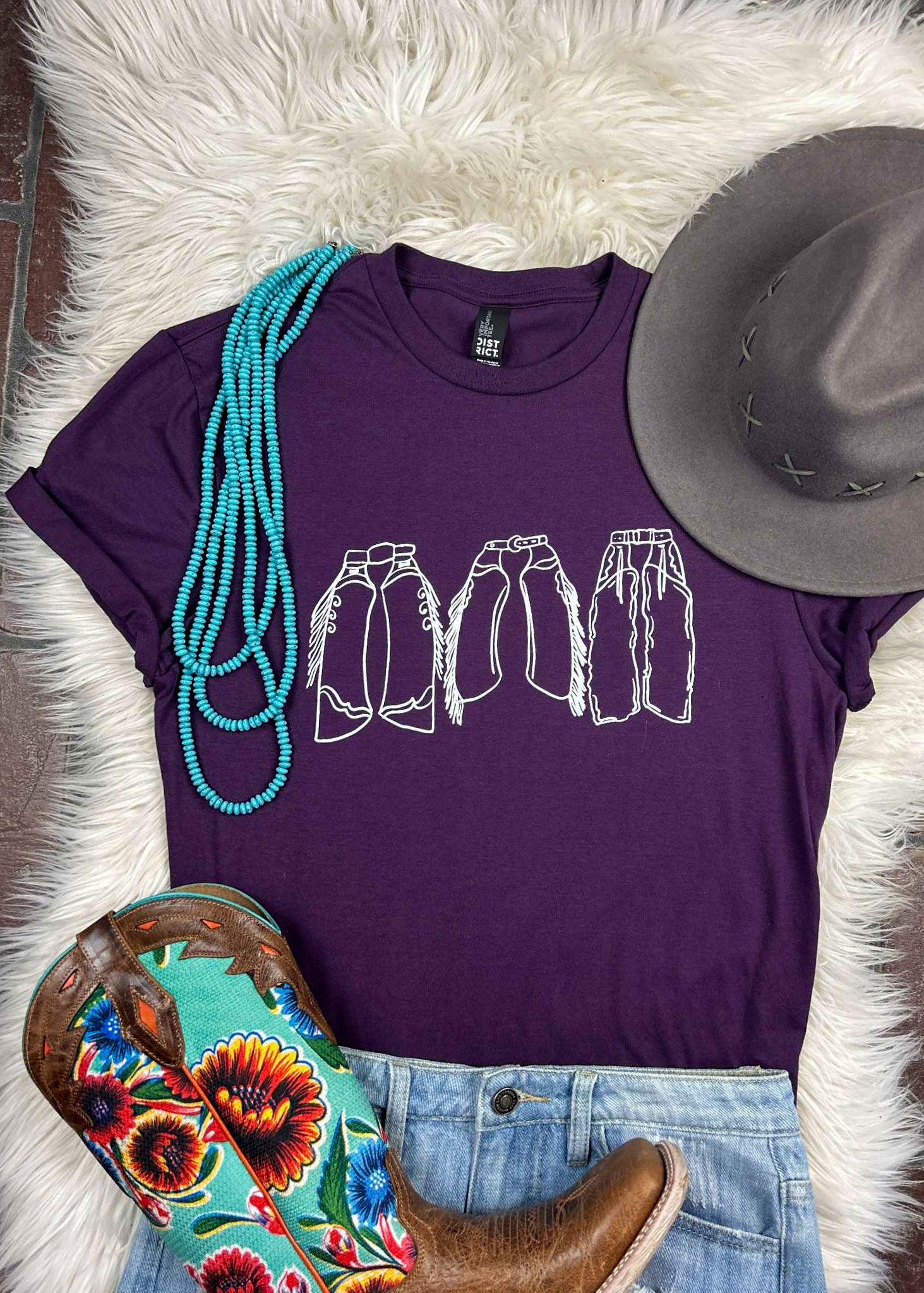 Eggplant Chaps Trio Short Sleeve Tee tcc graphic tee The Cinchy Cowgirl