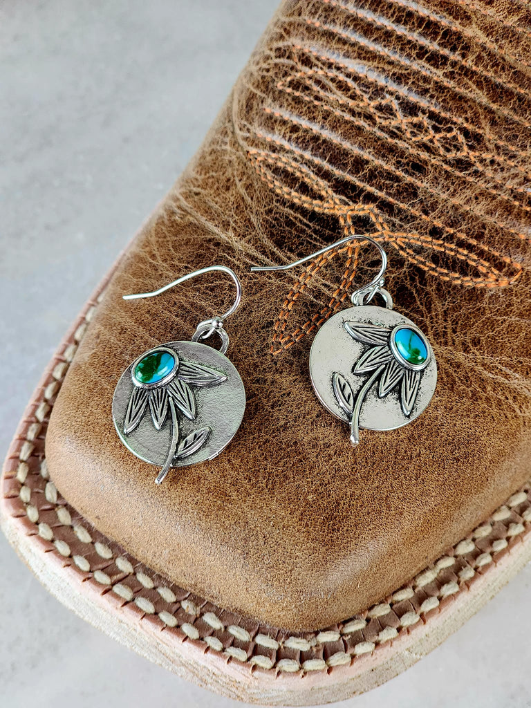 Floral Round Turquoise Earrings on leather cowboy boots