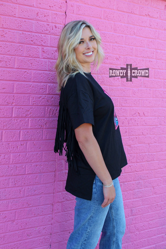 Side angled short sleeve black tee with elbow length sleeves and fringed back. Shirt slits at bottom to hip so that it can be tucked in or give a layered look. 