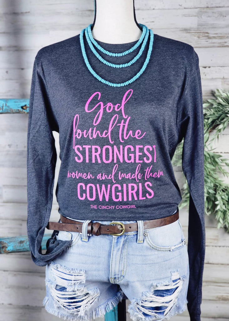 Dark Heather Grey God Found The Strongest Women Long Sleeve Graphic Tee graphic tee long sleeve The Cinchy Cowgirl