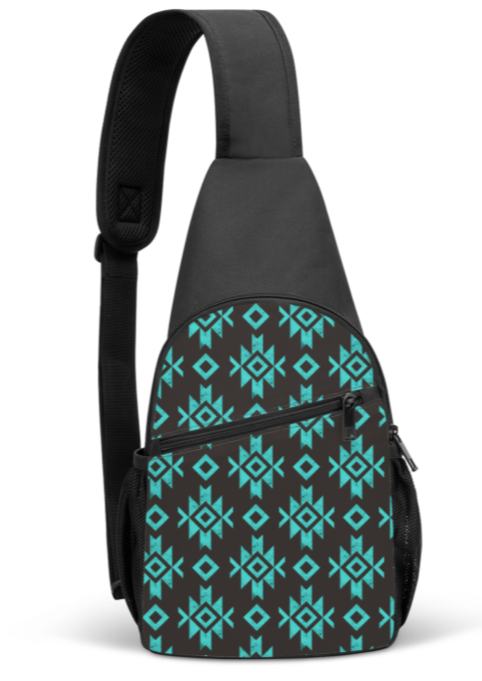 Southwestern sling bag with turquoise aztec print and black background. Adjustable strap, zippered top pocket and side pocket are visible. 