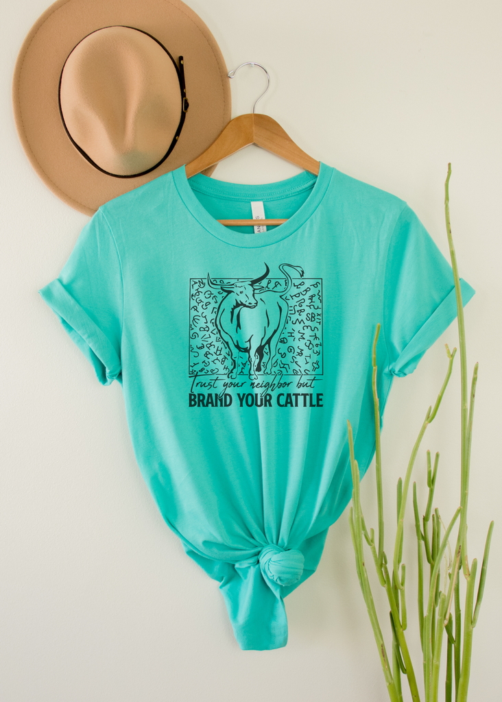 Brand Your Cattle Short Sleeve Tee [4 colors] tcc graphic tee - $19.99 The Cinchy Cowgirl Small Teal 