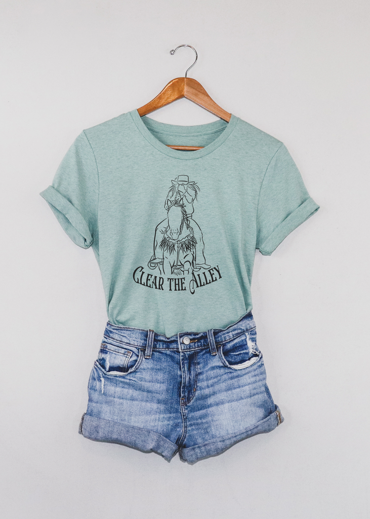 Clear The Alley Short Sleeve Tee [4 Colors] tcc graphic tee - $19.99 The Cinchy Cowgirl Small Dusty Blue 
