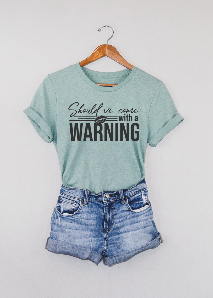 Come With A Warning Short Sleeve Tee [4 Colors] tcc graphic tee - $19.99 The Cinchy Cowgirl Small Dusty Blue 