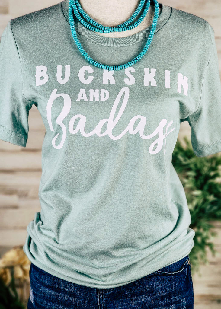 Dusty Blue Buckskin & Badass Short Sleeve Graphic Tee tcc graphic tee The Cinchy Cowgirl   