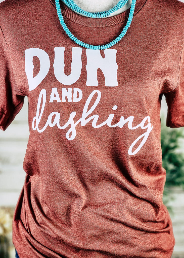 Heather Clay Dun & Dashing Short Sleeve Graphic Tee tcc graphic tee The Cinchy Cowgirl   