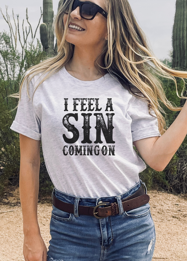 I Feel A Sin Coming On Short Sleeve Tee [4 colors] tcc graphic tee - $19.99 The Cinchy Cowgirl Small Ash 