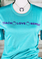 Teal Teach Love Repeat Short Sleeve Graphic Tee tcc graphic tee The Cinchy Cowgirl   