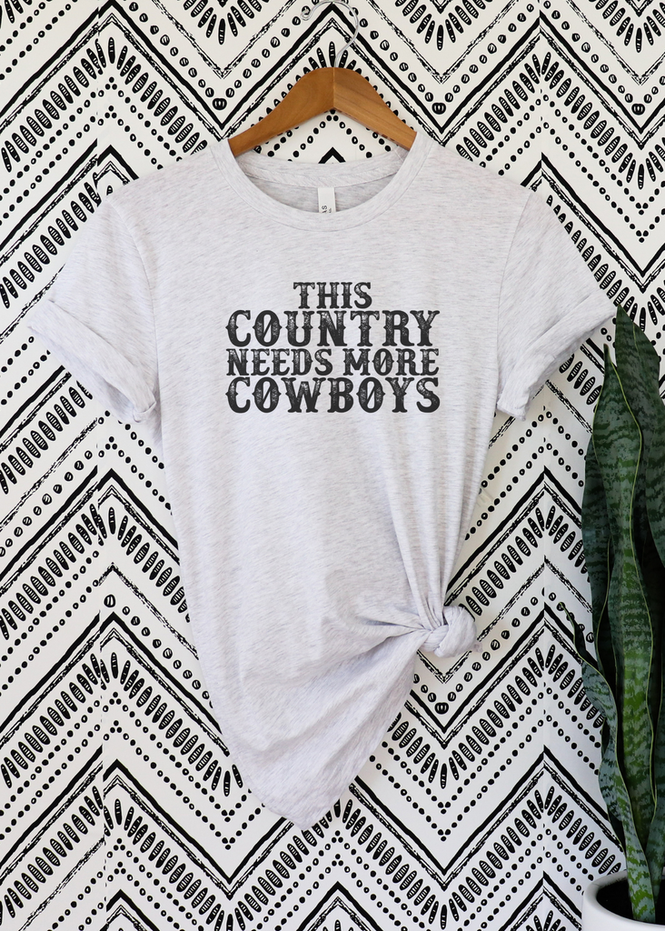 This Country Needs More Cowboys Short Sleeve Tee [4 colors] tcc graphic tee - $19.99 The Cinchy Cowgirl Small Ash 