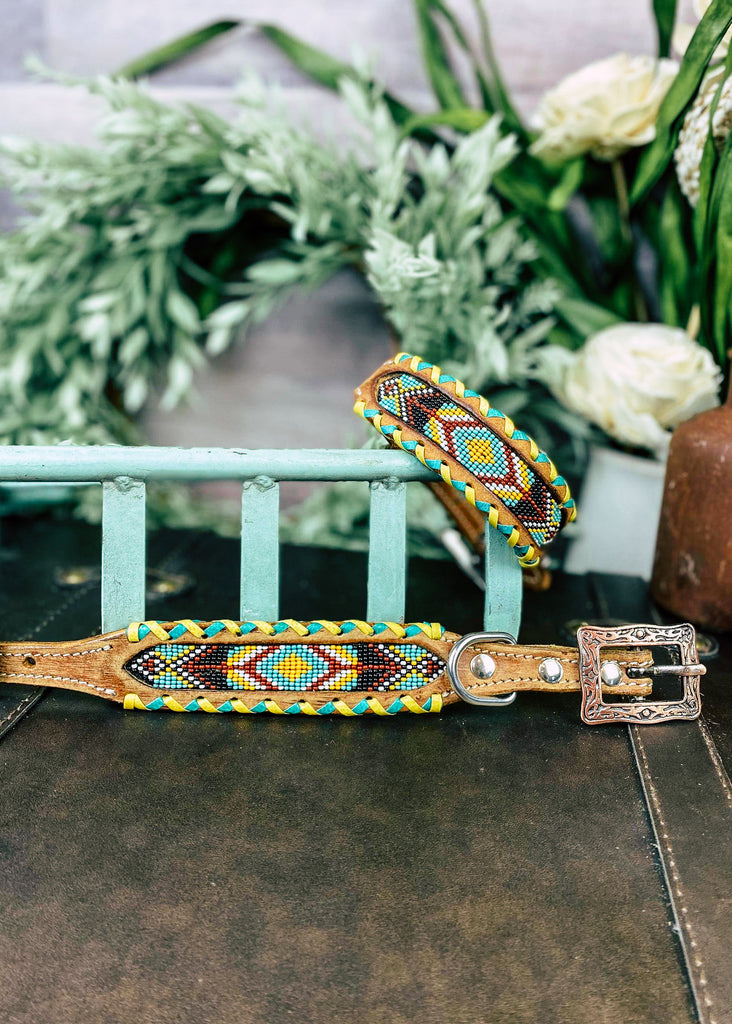 Yellow & Teal Aztec Beaded Stitched Dog Collar with floral decor background