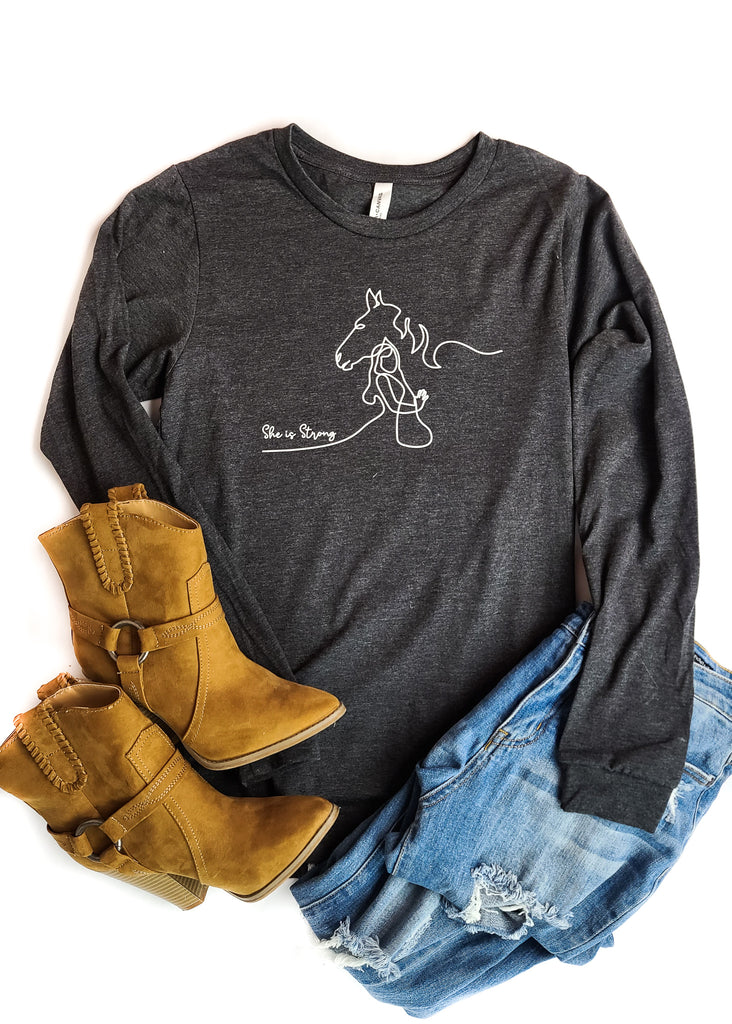 Dark Heather Grey She is Strong Long Sleeve Graphic Tee graphic tee long sleeve The Cinchy Cowgirl   