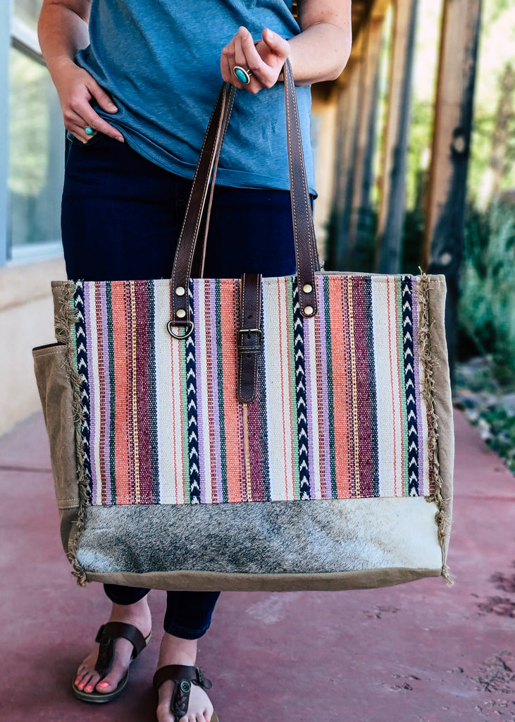 Pastel Hues Aztec Weekender Bag on model outside